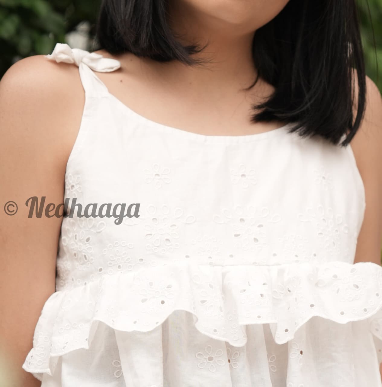 Ivorya –White Hakoba Peplum top with Layered Frills